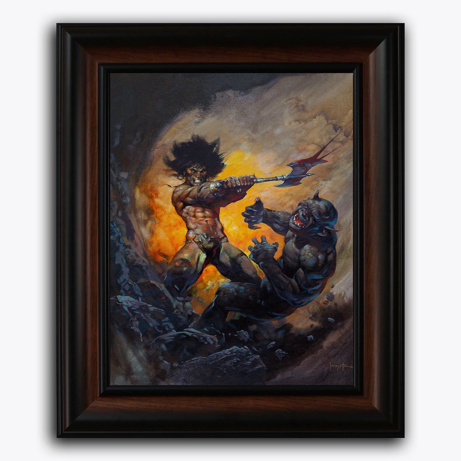 Framed fine art print of Frank Frazetta’s “Barbarian with Axe,” featuring a muscular warrior mid-battle, swinging an axe at a monstrous foe amid fire and smoke.