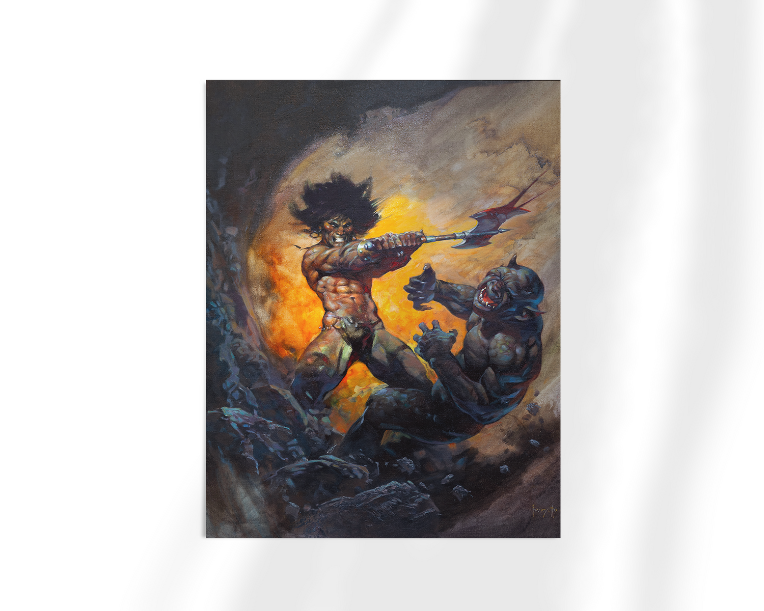 Framed fine art print of Frank Frazetta’s “Barbarian with Axe,” featuring a muscular warrior mid-battle, swinging an axe at a monstrous foe amid fire and smoke.