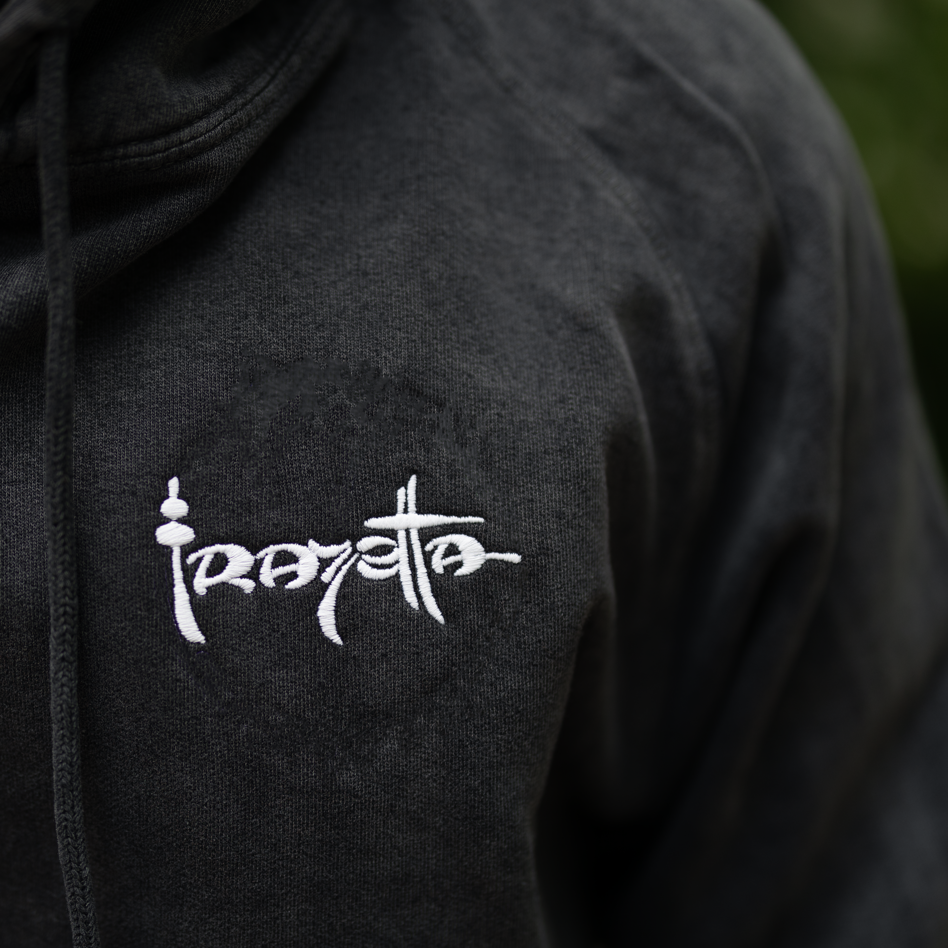 Photo of a Man wearing the Grey Wizard hoodie – The hoodie features Frazetta&