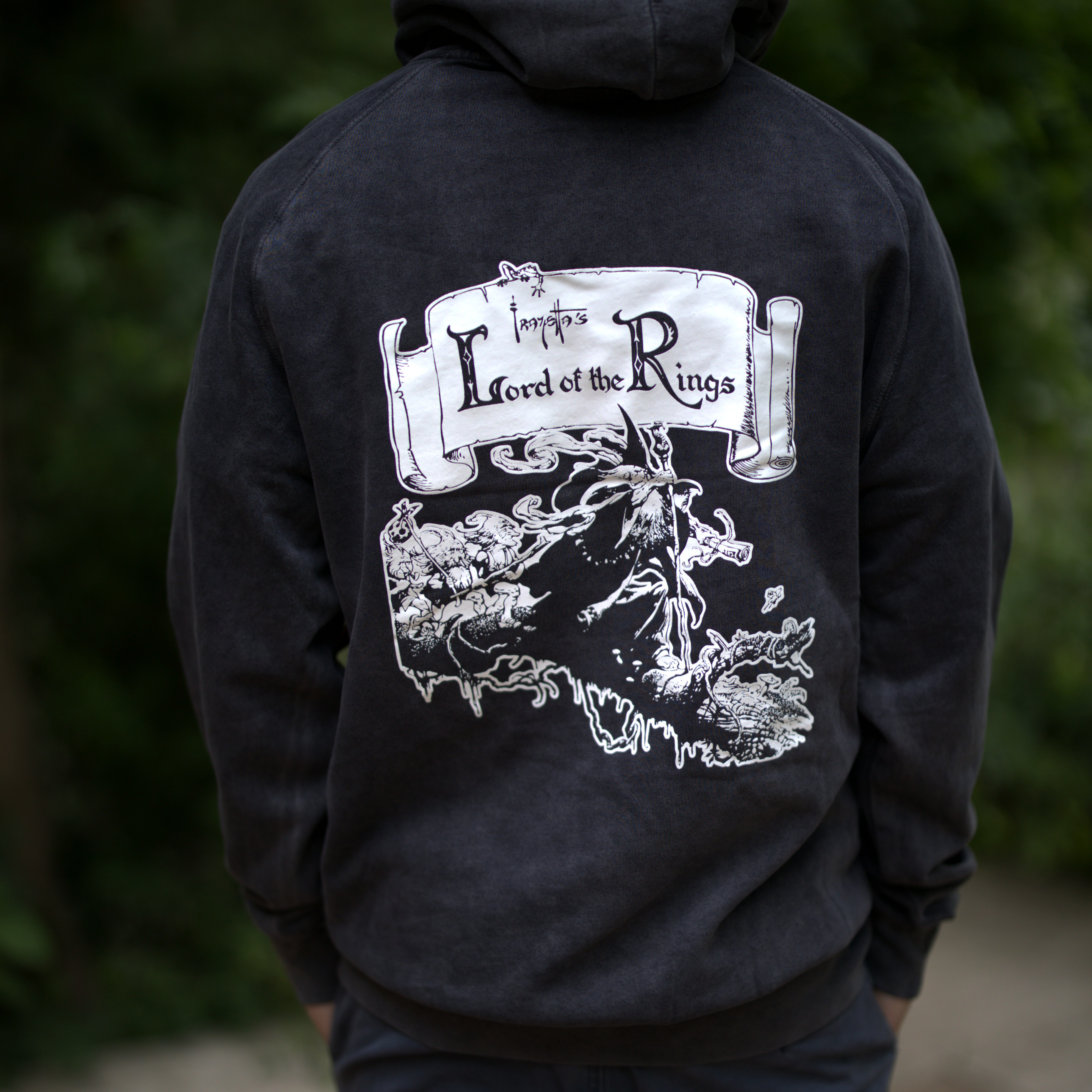 Photo of a Man wearing the Grey Wizard hoodie – The hoodie features the Frazetta&