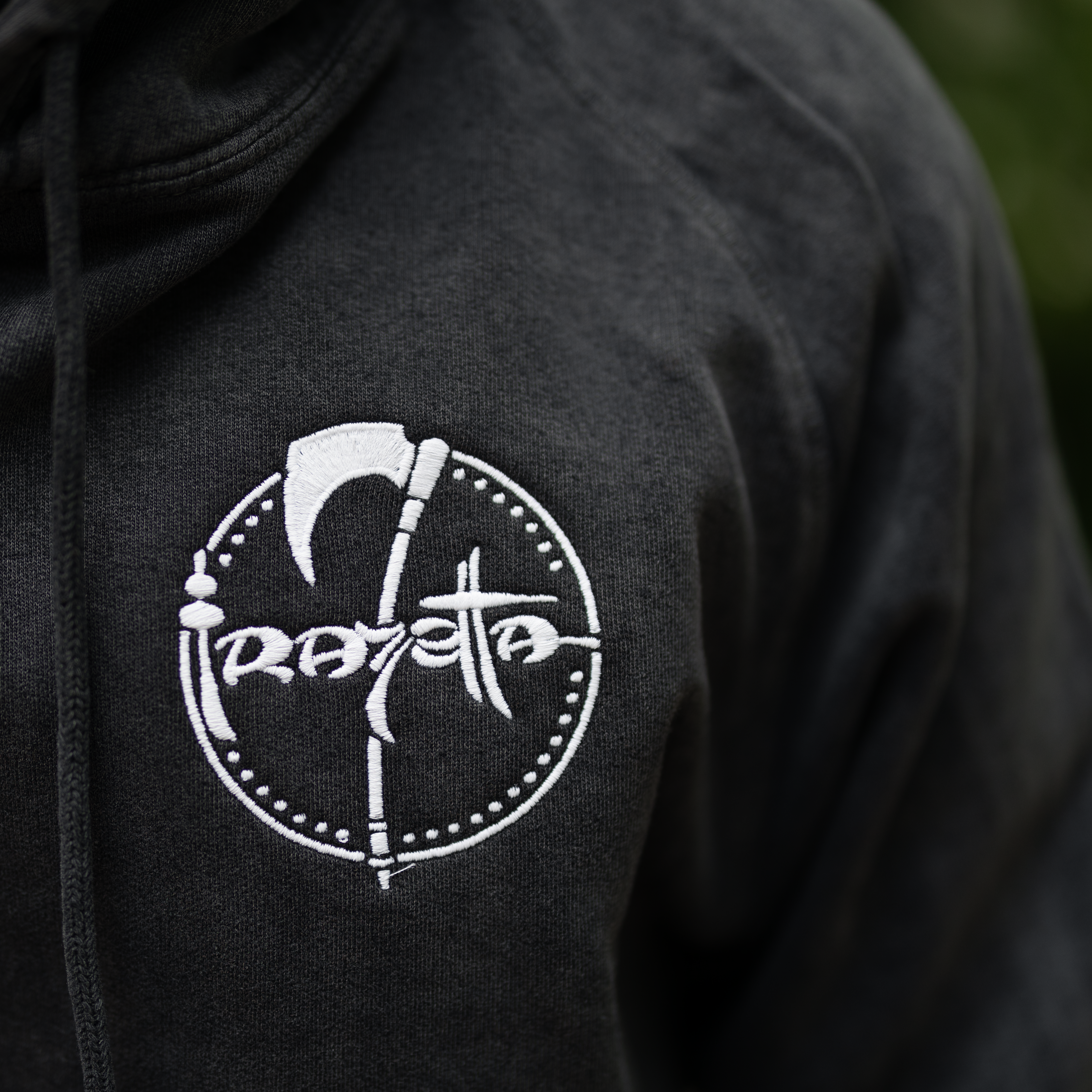 Photo of a Man wearing the Grey Wizard hoodie – The hoodie features the Frazetta Art Museum&