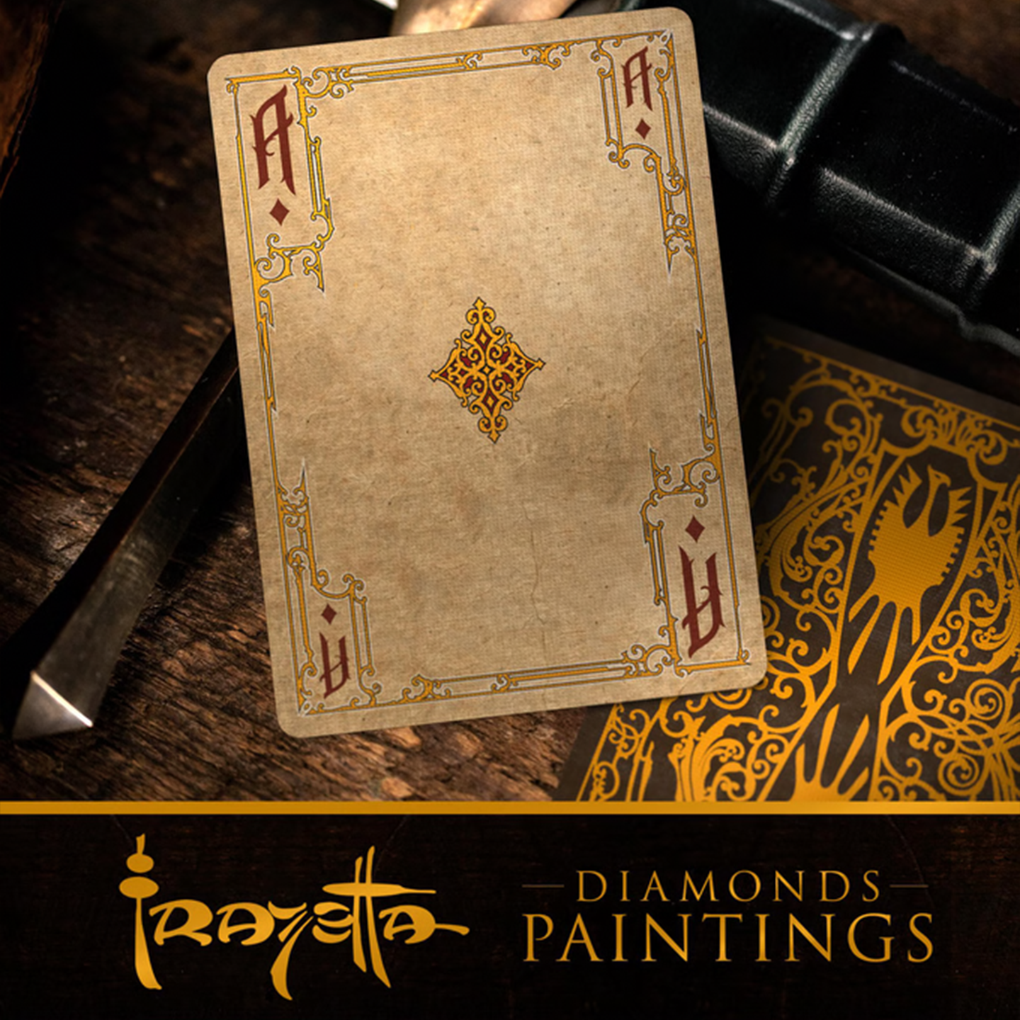 A close-up of an Ace of Diamonds from the Frazetta Paintings Edition playing card deck. The card features an ornate, vintage-style border with delicate filigree and a stylized club symbol at its center. Beneath it, additional cards are partially visible, showcasing intricate artwork and embossed detailing. A knife rests nearby, enhancing the dramatic composition.