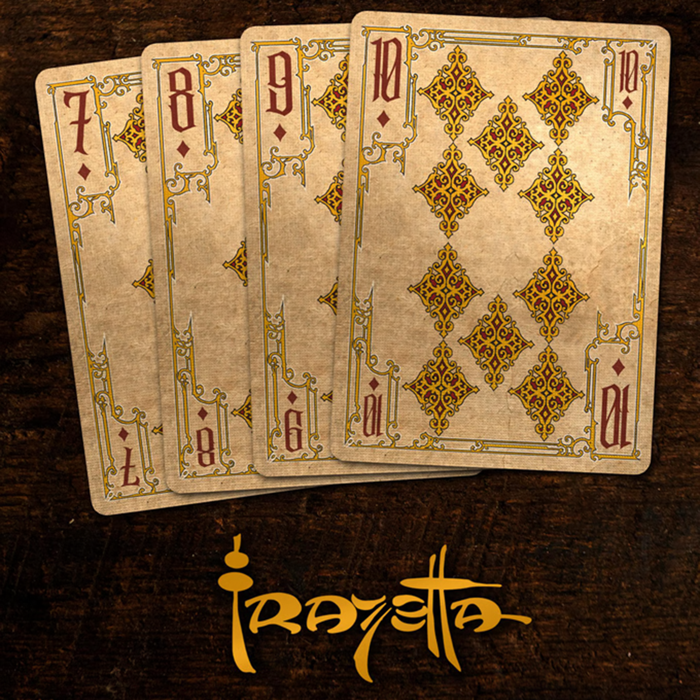 A close-up of cards seven through ten from the Frazetta Paintings Edition playing card deck. The cards feature an ornate, vintage-style border with delicate filigree and a stylized diamond symbol at its center. Beneath it, additional cards are partially visible, showcasing intricate artwork and embossed detailing.