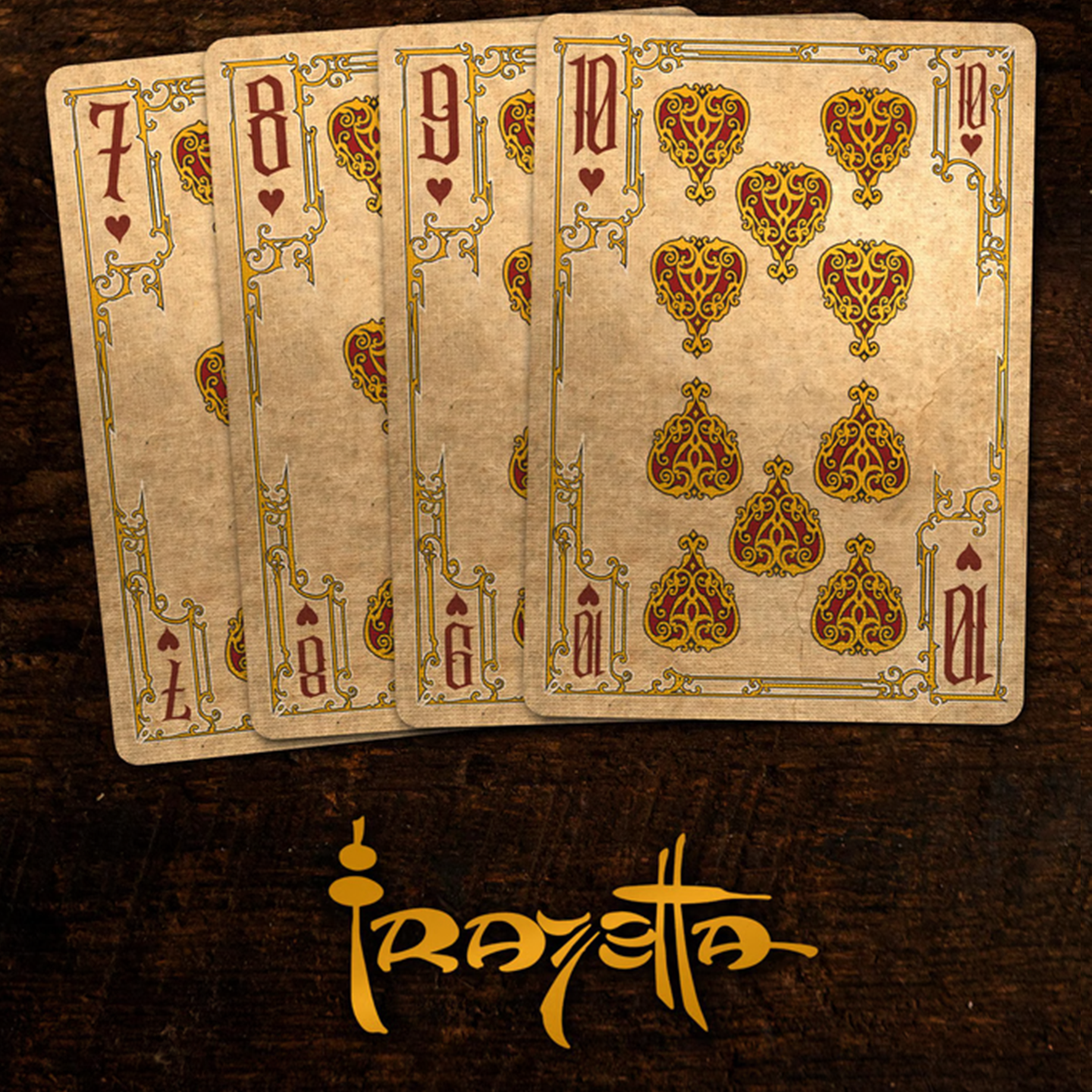 A close-up of cards seven through ten from the Frazetta Paintings Edition playing card deck. The cards feature an ornate, vintage-style border with delicate filigree and a stylized heart symbol at its center.