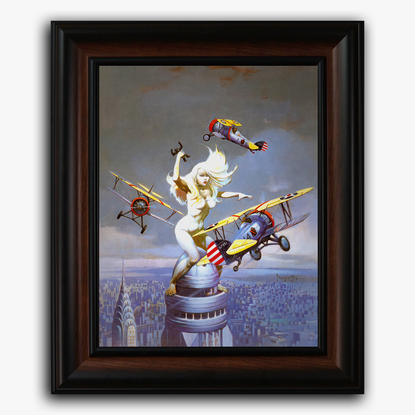 Framed art print of Frank Frazetta’s “Queen Kong,” depicting a towering blonde woman clinging to the top of a skyscraper as biplanes swarm around her, evoking a gender-flipped King Kong scene with a vibrant, dramatic sky and cityscape below