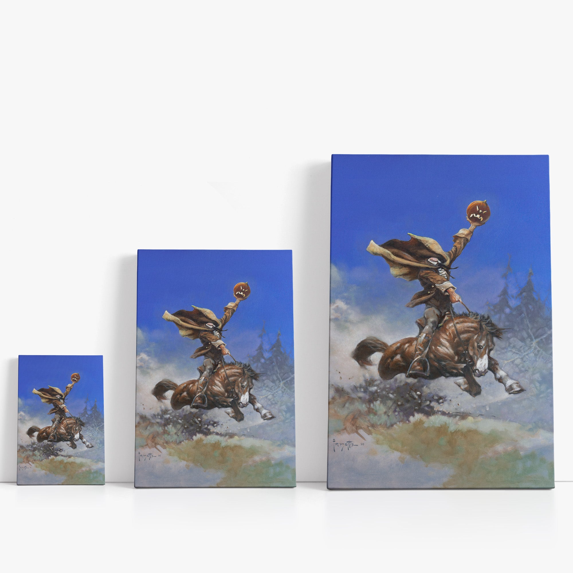 Three wrap-around canvas prints of Frazetta’s Headless Horseman in different sizes, showcasing the artwork with mirror-wrapped edges for a seamless, dimensional look.