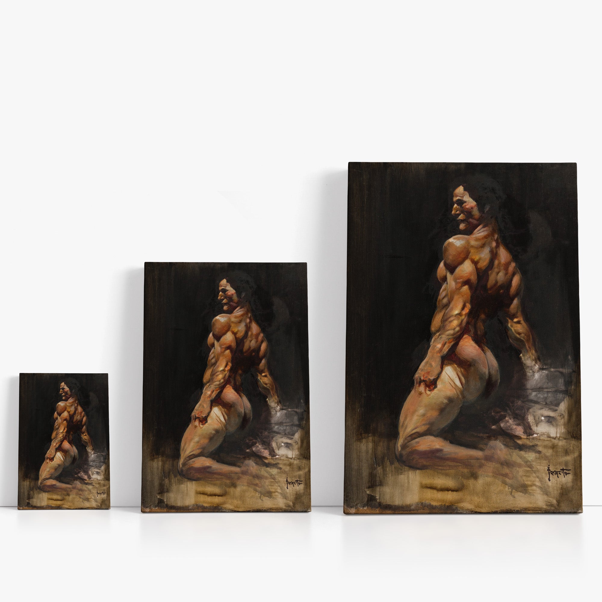 Three wrap-around canvas prints of Frazetta’s Man Kneeling in different sizes, showcasing the artwork with mirror-wrapped edges for a seamless, dimensional look.