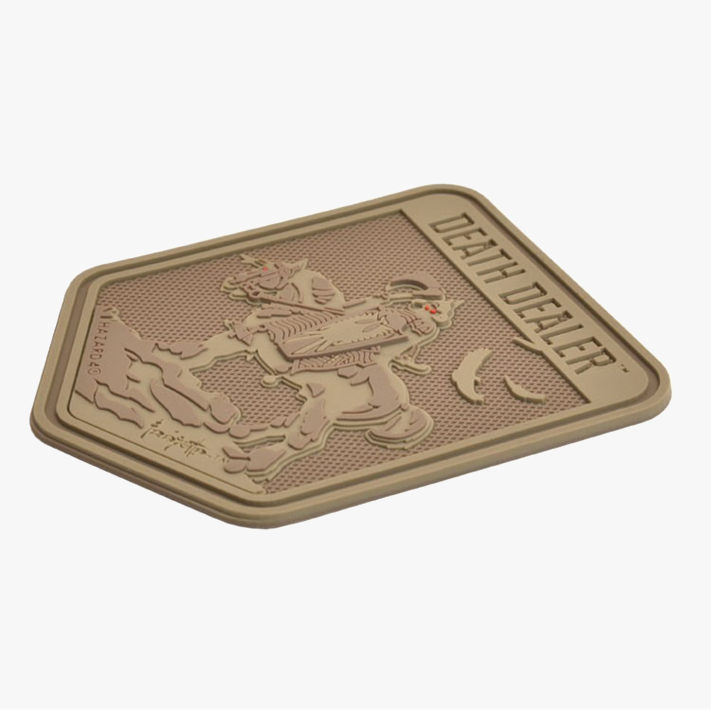 Angled view of the tan Death Dealer patch, highlighting its embossed design and textured finish for tactical gear customization