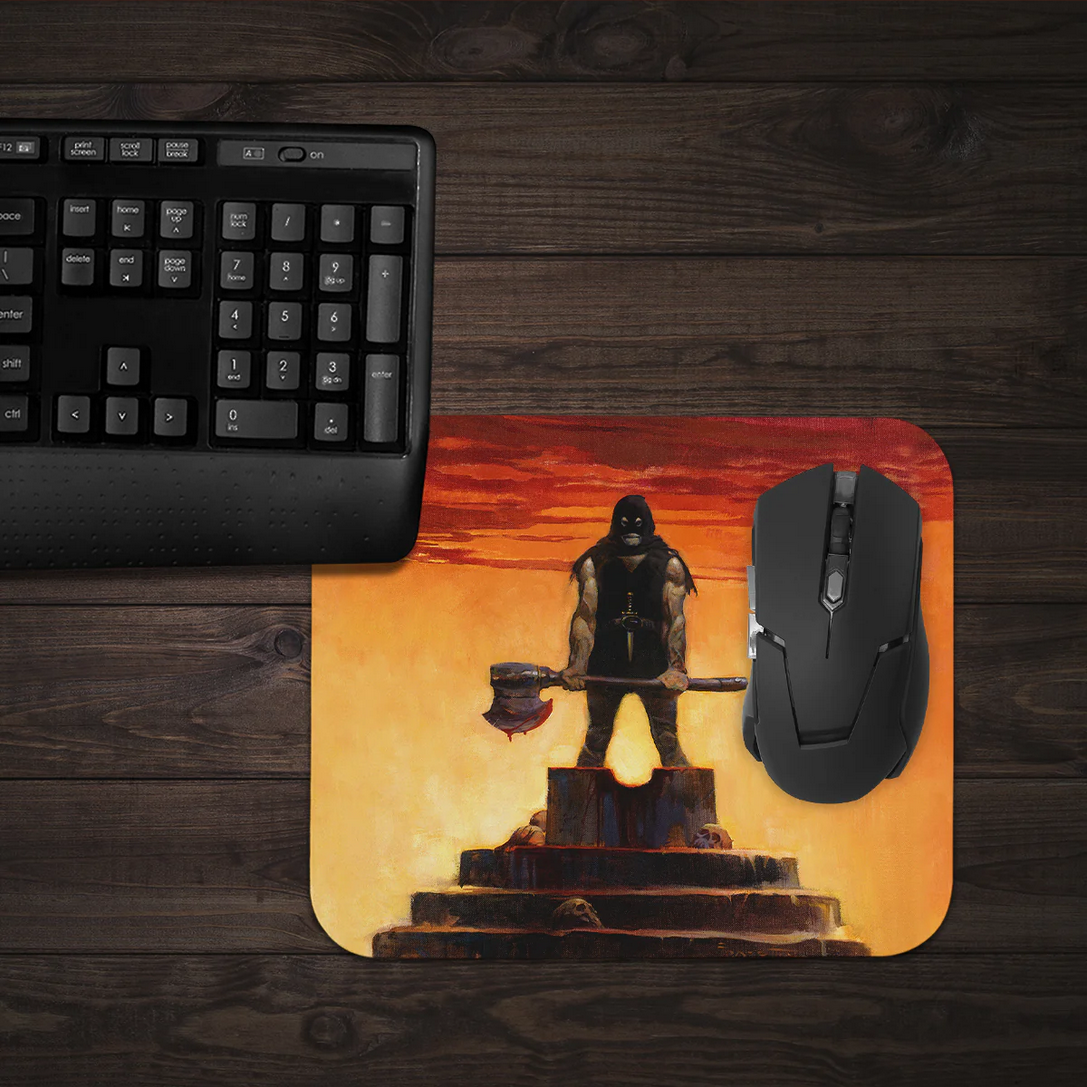 Executioner mousepad on a gaming desk, showcasing Frazetta’s dramatic fantasy artwork