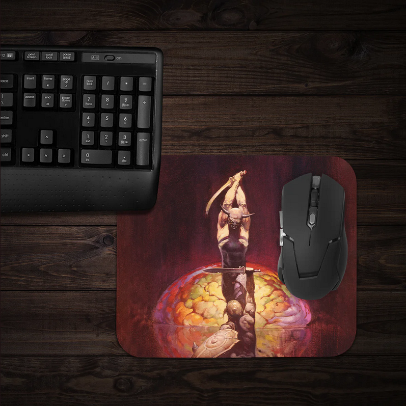 The Brain mousepad placed on a desk with a sci-fi/horror-themed setup