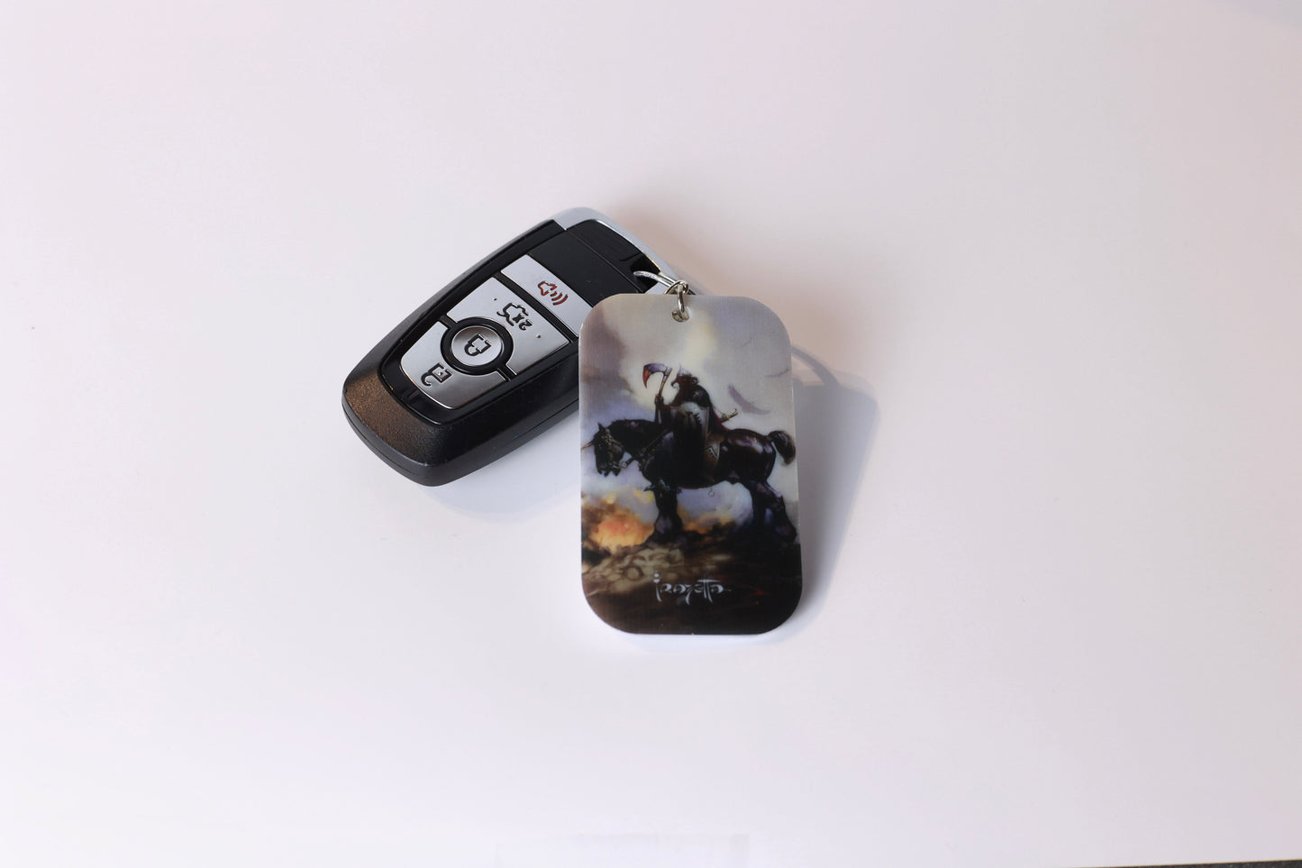 Frazetta Keychain- White Backing