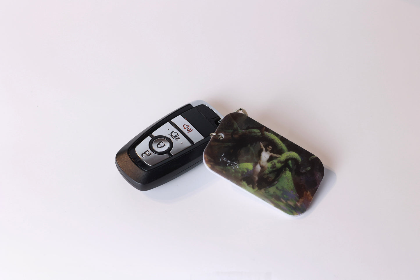 Frazetta Keychain- White Backing