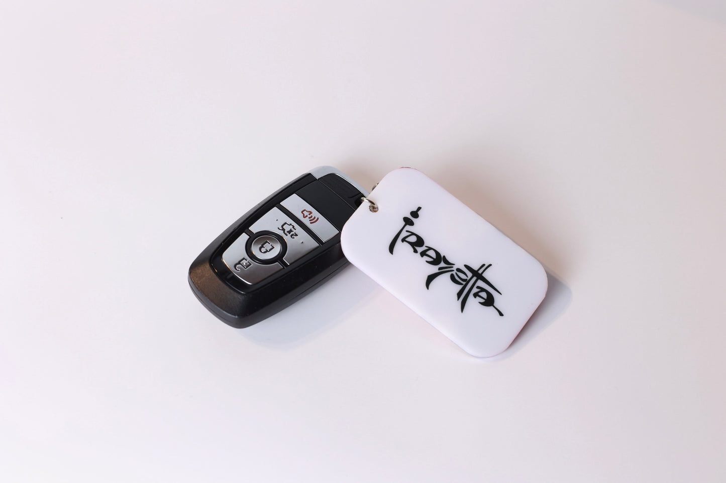 Frazetta Keychain- White Backing