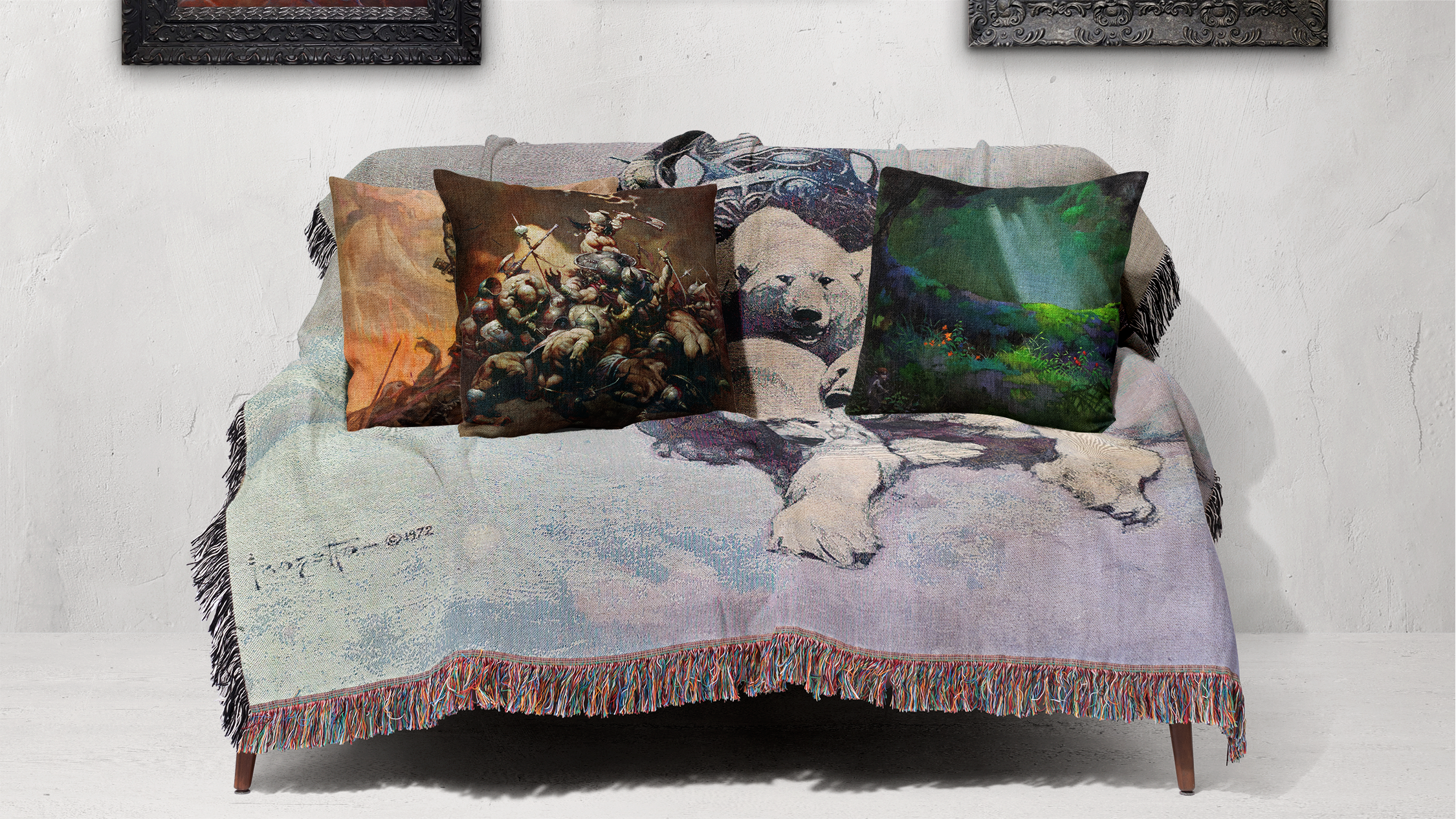 Frazetta woven blanket featuring Silver Warrior draped over a sofa, paired with three throw pillows showcasing iconic fantasy artwork, including The Destroyer and Glade of the Pixies, creating a striking and cozy display