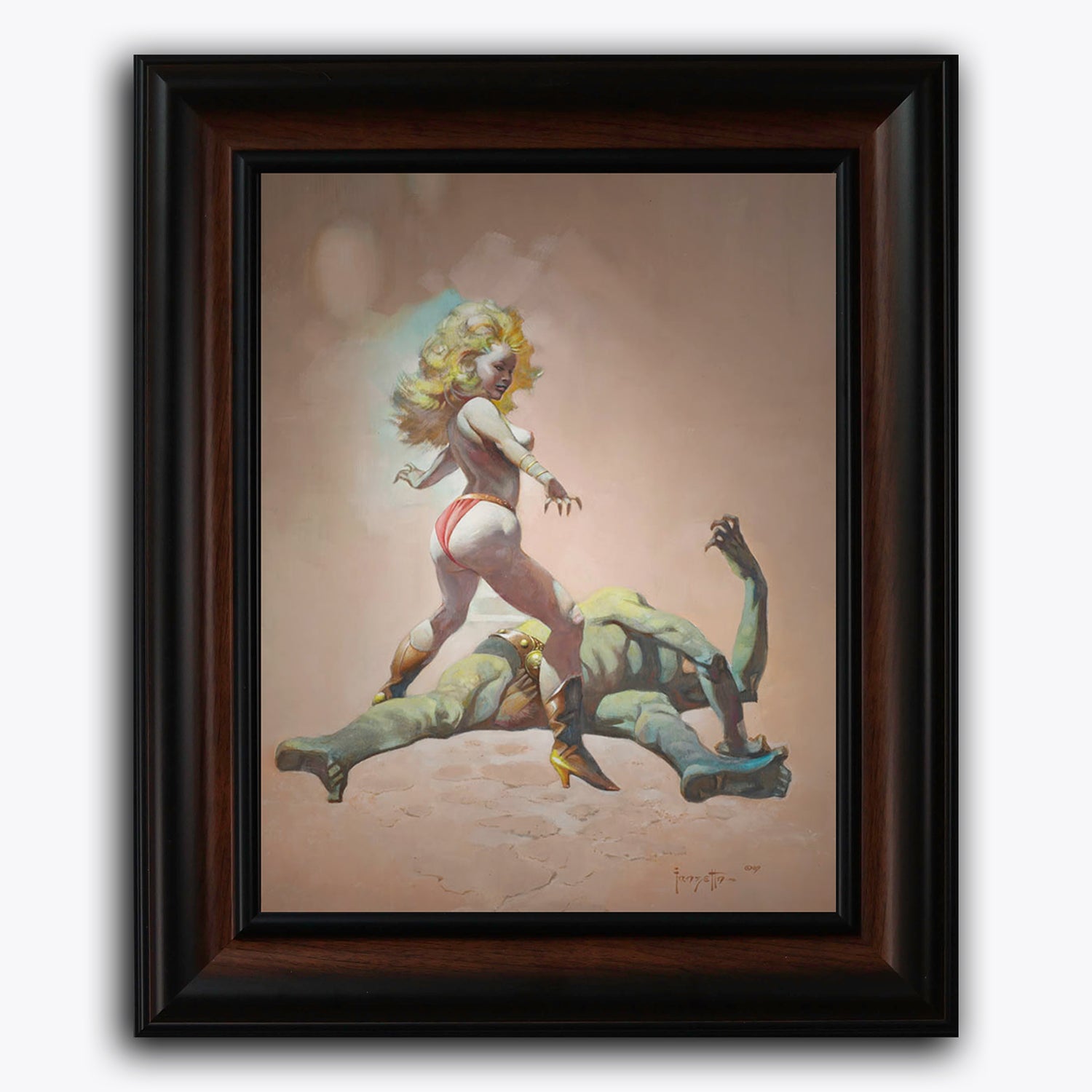 Framed fine art print of Frank Frazetta’s Countess and the Green Man, showing a blonde woman in a commanding stance atop a defeated green-skinned creature. The minimalist, sandy background highlights her fierce posture and flowing hair.
