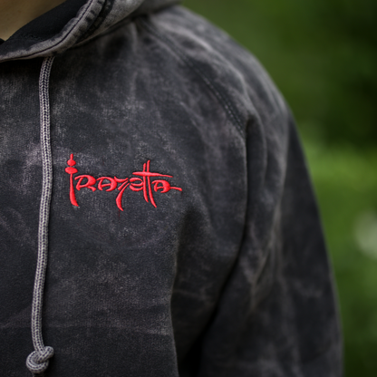 Photo of a man wearing the Death Dealer Crimson Hoodie – the front features the Frazetta&