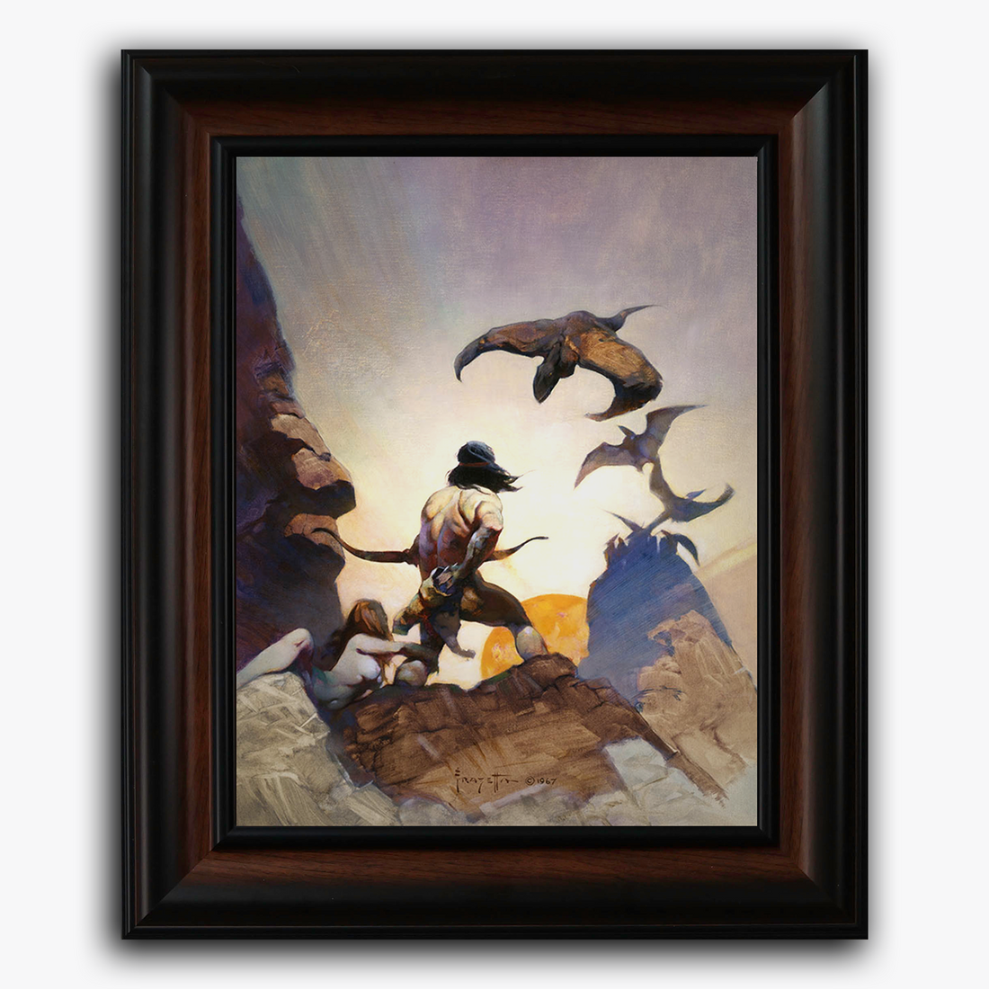 Framed fine art print of Frank Frazetta’s Return of Jongor, depicting a powerful figure bracing for battle against a swarm of prehistoric, winged creatures as sunlight bursts through the rocky cliffs behind him.