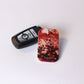 Frazetta Keychain- White Backing